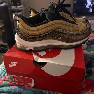 Nike Air Max 97 Gold and Black Sneakers